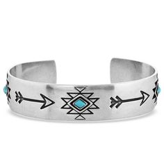 Montana Silversmiths Only Forward Turquoise Silver Cuff BC5034 Details Moving only forward, never back. An arrow can never go backward. Our Only Forward Turquoise Silver Cuff is a silver-toned cuff adjustable ring. Within the ring are etched arrows and geometrics designs with diamond-shaped turquoise stones. This ring is adjustable and one size fits most. Dimensions Width 1.000000 Height 0.000000 Length 6.500000 Materials Antique silver over a brass base. Turquoise stone. All Montana Silversmith Turquoise Western Jewelry, Montana Silversmith Rings, I Am My Mother's Daughter, Jewelry Photoshoot Ideas, Silversmith Rings, Western Couture, Cowgirl Life, Western Bracelets, Cowboy Life