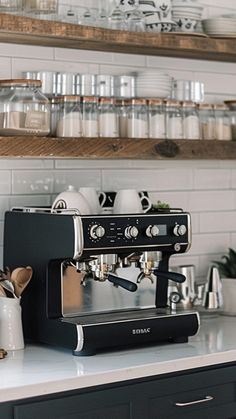 an espresso machine sitting on top of a counter