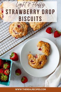 strawberry drop biscuits on a white plate with strawberries next to it and text overlay that reads, light & fluffy strawberry drop biscuits