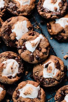 cookies with marshmallows and chocolate chips on a cooling rack, ready to be eaten