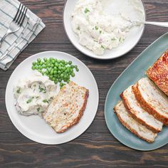 two plates with meat, mashed potatoes and peas