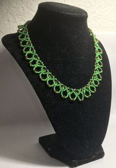 A handmade glass beaded necklace that is perfect for any occasion: parties, holidays, birthdays, anniversaries. All products are hand-crafted by my mother. Dimensions: - Actual Length: 21.0 cm - Collar Length: 13.0 cm - Width: 13.0 cm - Height: 2.0 cm Lightweight, high quality with a beaded hook as a clasp. Will respond to concerns and suggestions promptly. Shipping costs: Free Domestic Shipping. All orders are sent by air-mail with tracking number. Time of delivery: Estimated 1-3 days for domes Artisan Beaded Necklaces With Spacer Beads As Gift, Celebration Green Beaded Necklace With Colorful Beads, Handmade Beaded Necklaces With Round Beads For Celebration, Unique Beaded Necklaces With Spacer Beads For Gift, Round Beaded Necklace With Spacer Beads As Gift, Handmade Glass Beads For Jewelry Making, Handmade Czech Glass Beads For Jewelry Making, Handmade Czech Glass Beads For Gifts, Handmade Czech Glass Beads As Gift