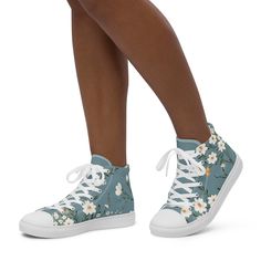 Delicate Blooms Women's High-Top Canvas Shoes Step into a world of comfort and style with our Delicate Blooms Women's High-Top Canvas Shoes. Elevate your wardrobe with these turquoise shoes adorned with a charming floral design, perfect for those who value both comfort and fashion. **Key Features - Cute Floral Design on Turquoise Canvas - Crafted with 100% Polyester Canvas Upper Side - Ethylene-Vinyl Acetate (EVA) Rubber Outsole for Enhanced Durability - Breathable Lining and Soft Insole for All-Day Comfort - Faux Leather Toe Cap for Elegance and Sophistication - Padded Collar and Lace-Up Front for a Secure, Adjustable Fit Versatile and Convenient: Designed for your convenience, these high-top canvas shoes are perfect for any occasion. Whether you're strolling around town or heading out fo Turquoise Shoes, Shoes Trainers, Canvas Shoes, Shoe Game, Stylish Women, High Tops, High Top Sneakers, Athletic Shoes, Daisy