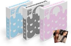 three binders with different designs on them and an image of a person in the background