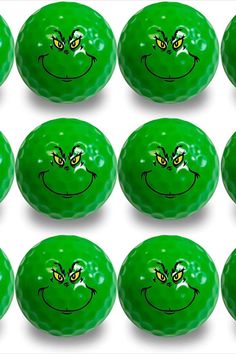 many green balls with faces drawn on them