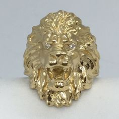 Men's Lion Face Diamond Ring 14K Yellow Gold  Size 11.5  Stamped  and tested 14K weighting 18.4 Gr  Diamond eyes total weight .05 Carat Lion Face, Diamond Eyes, Men's Jewelry Rings, Rings Statement, Statement Rings, Diamond Ring, Jewelry Watches, Lion, Mens Jewelry