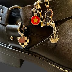 How cute are these!? Dress up your new boots with some charms! 👢 So easy to make different looks, change the charms around, add/collect new ones. The possibilities are endless. What a cool way to do your OWN thing 💃🏻 Chain is 6" with "S" clasp, charms have easy lobster 🦞 closures. Easy to move around, fit easily over shoe laces. The shackle,carabiner is totally functional and versatile.  ⭐️You could totally use this for you bag! 💼  🌟 Please reach out with questions! I love to collaborate, so ask about variations. Salisbury, Boot Charms, Do Your Own Thing, Shoe Boot, Chain Dress, New Boots, You Bag, Shoe Laces, Shoe Boots