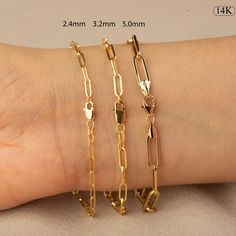 PLEASE READ FULL DESCRIPTION & SHOP POLICIES 14K Gold Paperclip Bracelet / Gold Paper Clip Chain Bracelet / Gold Layering Chain Bracelet / 14k Gold Chain Bracelet / Chain Link Bracelet ★★ Description ★★ Experience the modern elegance of our 14K Gold Paperclip Bracelet, a chic and versatile piece perfect for any occasion. Meticulously handcrafted from real 14K solid gold, this bracelet offers a sleek and contemporary look. Available exclusively in gold, it features a semi-hollow paperclip chain t Gold Paperclip Bracelet Tarnish Resistant, 14k Gold Link Charm Bracelet With Lobster Clasp, 14k Gold Paperclip Bracelet For Gift, Gold 14k Paperclip Bracelets, 14k Gold Paperclip Bracelets, Paperclip Bracelet, Gold Chain Bracelet, Bracelet Chain, Gold Paper