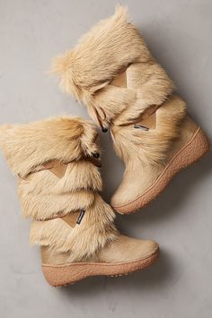 Gone are the days when you had to choose between styled or weatherproofed. The Anna boots let you have it all in winter footwear that's fashioned for beauty and built to conquer the elements. Handcrafted in a premium goat fur shaft, this feminine boot features a soft, smooth, calfskin hair-on leather shoe in fine contrast to the fluffy goat fur shaft that's detailed with a leather lace-up front. Our snow-proof, water-repellent boot features a genuine wool lining throughout the shaft, shoe and fo Anna Boots, Fluffy Goat, Feminine Boots, Apre Ski, Bling Crocs, Waterproof Suede Boots, Winter Boots For Women, Women's Winter Boots, Winter Footwear