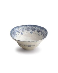 a blue and white bowl on a white background