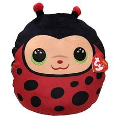 a red and black stuffed animal with big eyes