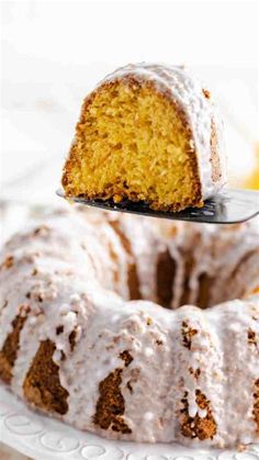 a bundt cake on a white plate with a fork