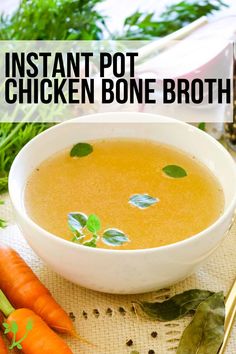 a bowl of instant pot chicken bone broth next to carrots and parsley