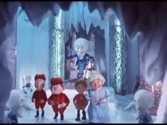 the three little pigs are standing in front of an ice - covered stage with people dressed as snowmen