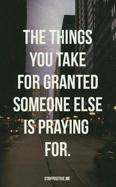 a city street with the words, the things you take for granted someone else is praying for