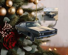 an old car ornament hanging from a christmas tree with ornaments around it and a rose in the foreground