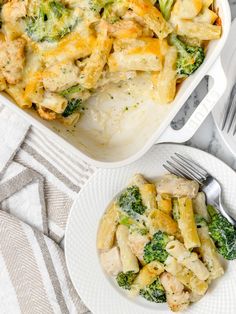 a casserole dish with chicken and broccoli in it next to a fork