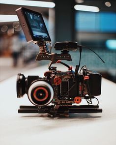 a small camera sitting on top of a table