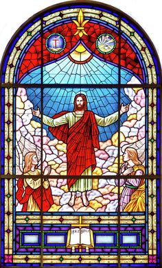 a stained glass window with jesus standing on it's knees and arms outstretched in front of him