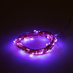 purple fairy lights on a black background