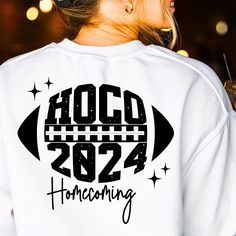 a woman wearing a white hoodie with the words hoccd 2012 on it