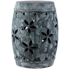 a gray and black ceramic garden stool with holes in the middle on an isolated white background