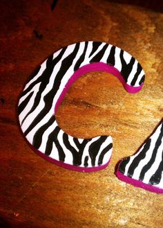 the letter c is made out of zebra print