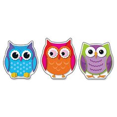 three colorful owls sitting next to each other