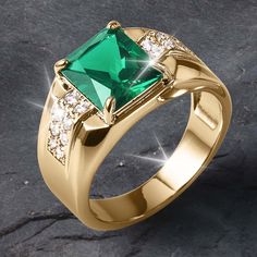 An impressive statement in our men’s rings. Set with a solitaire emerald cut, deep blue or evergreen Diamondeau®, flawless simulated diamond and flanked with further accent stones. Each piece is expertly crafted by our master jewelers from the finest 925 sterling silver plated in polished rhodium or gold finish Panna Ring, Gents Ring Design, Mens Gold Diamond Rings, Emerald Ring Design, Green Emerald Engagement Ring, Mens Emerald Rings, Stone Rings For Men, Emerald Engagement Ring Green, Stone Ring Design