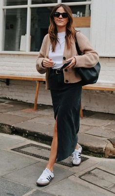 Black Maxi Skirt Street Style, Transitional Autumn Outfits, Casual Trainers Outfit, Uk Holiday Outfits, How To Wear A Black Skirt, Black Long Jeans Skirt Outfit, Skirt And Tennis Shoes Outfits, London Summer Outfit Ideas, Black Denim Skirt Outfit Winter