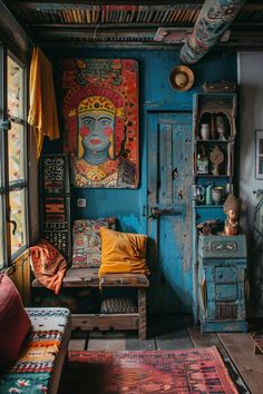 a room with blue walls and colorful rugs