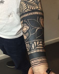 a person with a tattoo on their arm