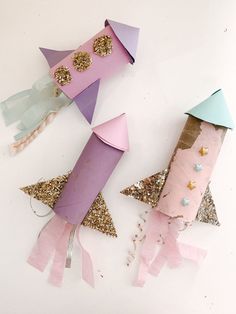 three different types of crafts made out of paper