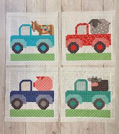 four quilted pictures of trucks with animals on them