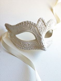 Simple and elegant, this mask is perfect as a part of Carnival, Halloween, Masquerade, or Mardi Gras party costume or could just be an amazing addition to your collection. S H I P P I N G - Processed same day or within 24 hours. 1-2 day guaranteed delivery services offered, add items to cart and click on shipping tab for rates. Pls leave a check out note with your need date & contact number (especially for expedited and custom orders) Msg for delivery time frames (Include your state/country) Elegant Masquerade Mask For Carnival Gift, Elegant Eye Mask For Masquerade, White Formal Masquerade Mask For Carnival, Elegant White Masquerade Mask For Carnival, Elegant White Masquerade Mask For Mardi Gras, Elegant Mardi Gras Masquerade Eye Mask, Elegant Mardi Gras Masquerade Mask, White Eye Mask Masquerade Mask As Gift, Elegant Eye Mask For Costume Party