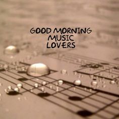 the words good morning music lovers are on top of an image of water droplets