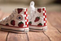 Shop for these unique checkered strawberry high top Converse sneakers! Each pair is hand-painted with strawberries on the sides and a funky checkered pattern on the back.  It takes about 3-4 weeks until the shoes are ready to be shipped, please select the correct shoe size when checking out.  Returns and refunds are not accepted due to the custom nature of the item. Converse Painting Ideas Low Tops, Converse Hand Painted, Hand Painted Converse High Tops, Painted High Tops, Custom Painted Shoes Ideas, Converse Strawberry And Bees, Shoes Painting Ideas Converse, Spring Hand-painted High-top Sneakers, Paint Converse