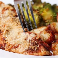 broccoli and red potatoes are sitting on a wooden cutting board, next to each other