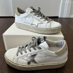 Like New Platform Sneakers With Silver Star And Gold Metallic Back. Only Worn Once, Perfect Condition Retailing Currently For $615, Willing To Negotiate Golden Goose Shoes, Golden Goose, Platform Sneakers, Silver Stars, Womens Shoes Sneakers, Like New, Gold Metal, Shoes Sneakers, White Gold