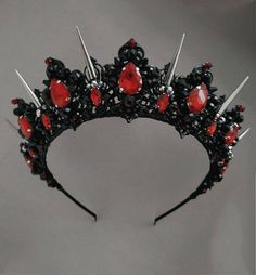 Crowns from the Exclusive Wedding Shop are always: * unique author's design * stunning detail * 100% handiwork * light weight for comfortable wearing * quality materials * large assortment for any occasion Luxurious black and red tiara. Made of black light metal and crystal and beads. This design of a black crystal tiara will ideally look like a wedding crown, a crown for an adult birthday, for a party of Heloween, for a Goth wedding. The crown height in the center is about 2 inches. Earrings le Persephone Crown, Black Halo Crown, Evil Queen Crown, Gothic Tiara, Prom Tiaras, Dark Wedding Theme, Black Tiara, Gothic Crown, Crown Aesthetic