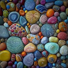 many different colored rocks are arranged together