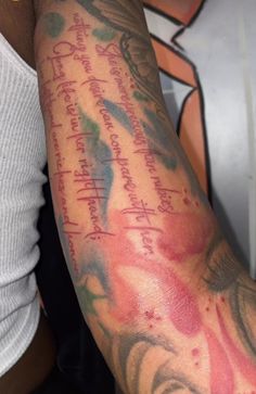 a person with a tattoo on their arm