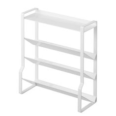 a white shelf with three shelves on each side