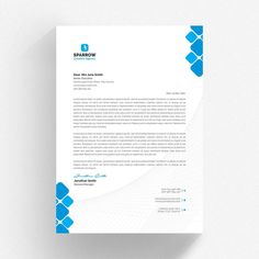 a blue and white letterhead with an abstract design on the front, and bottom corner