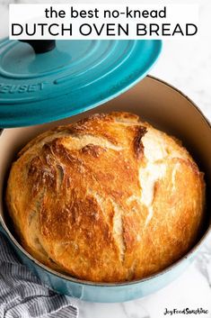 the best no - knead dutch oven bread is in a blue casserole dish