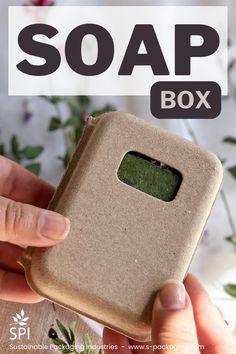 a person holding a soap box in their hand with the text soap box on it