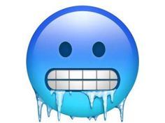 an emoticive smiley face with ice on it's tongue and eyes,