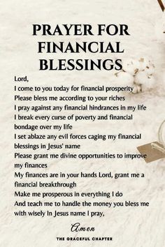 prayer for financial blessing card with cross and rosary on snow covered ground in white background