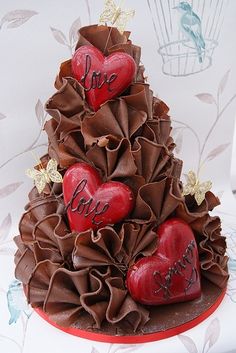 a chocolate christmas tree with hearts on top