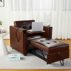 a brown leather chair with a laptop on it